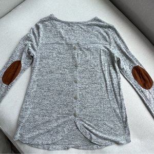 Pink Clover back button with elbow detail.